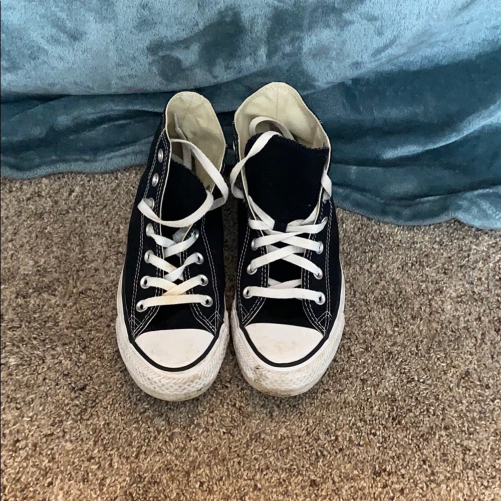 Black and white high top converse